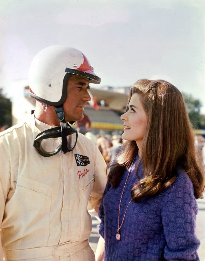 race car driver and woman